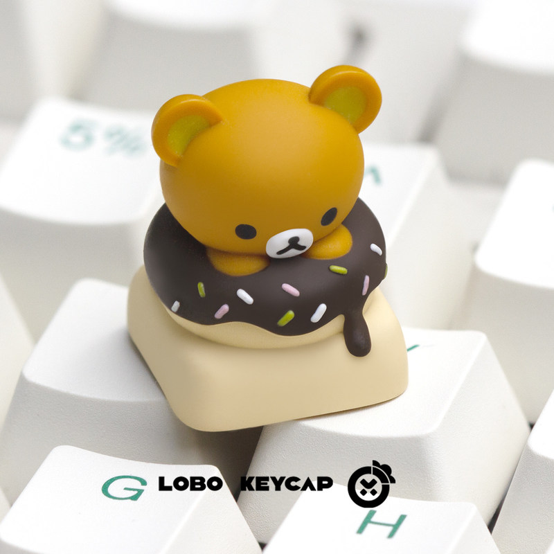 Gaming Keyboard Mechanical - คีย์แคปเรซิ่นรูปโดนัทริลัคคุมะน่ารัก แบบเปลี่ยนได้ สำหรับคีย์บอร์ดแบบกลไก คีย์แคปดีไซน์สร้างสรรค์สำหรับผู้ที่ชื่นชอบ คีย์แคปขายส่ง ของเล่น